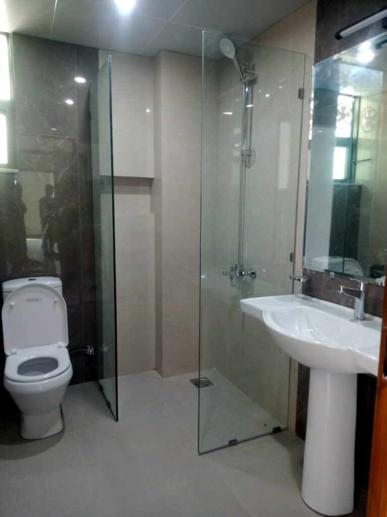 Bathroom with shower in Askari 12 Lahore apartment